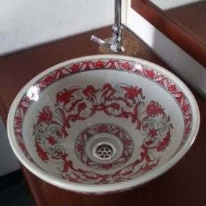 Hand painted porcelain wash basin.